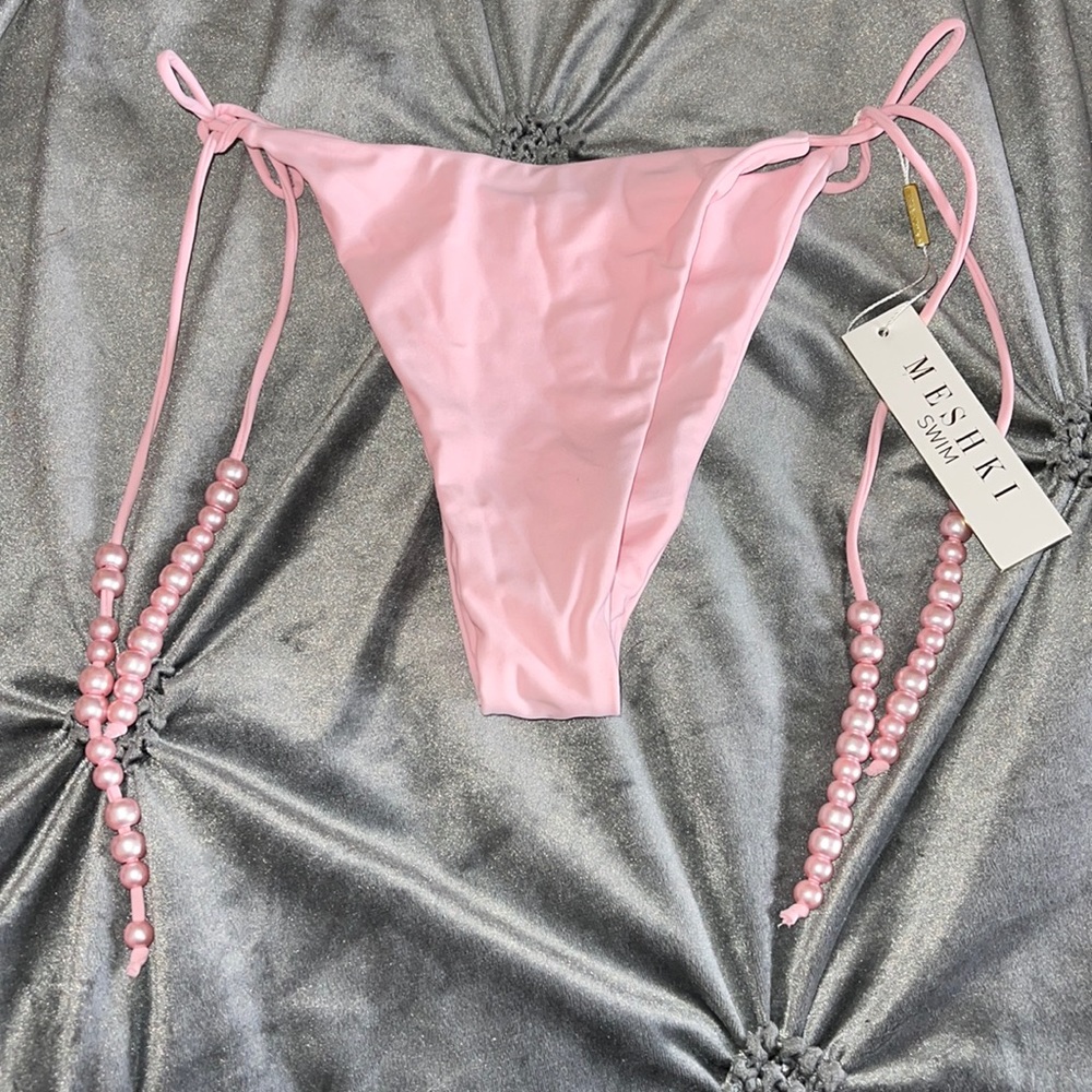 Swim bottoms with pearl accent